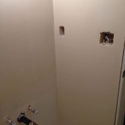 bathroom wall repaired and painted