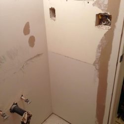 bathroom wall needing repair