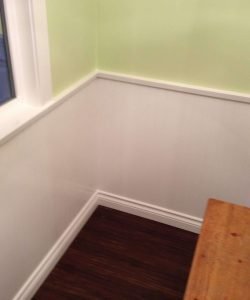 new wainscotting installed around kitchen table area