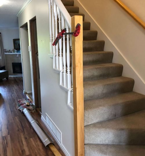 Newel Post Being Installed