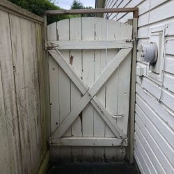 rotted gate needing replacement